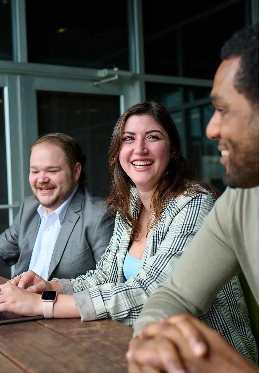 Team members collaborating during a meeting